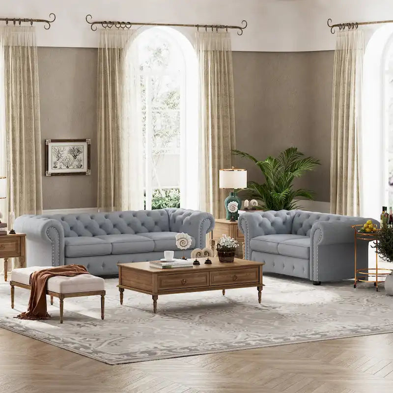Ensemble 2 pièces comprenant un canapé et une causeuse Chesterfield à accoudoirs roulés et capitonnés