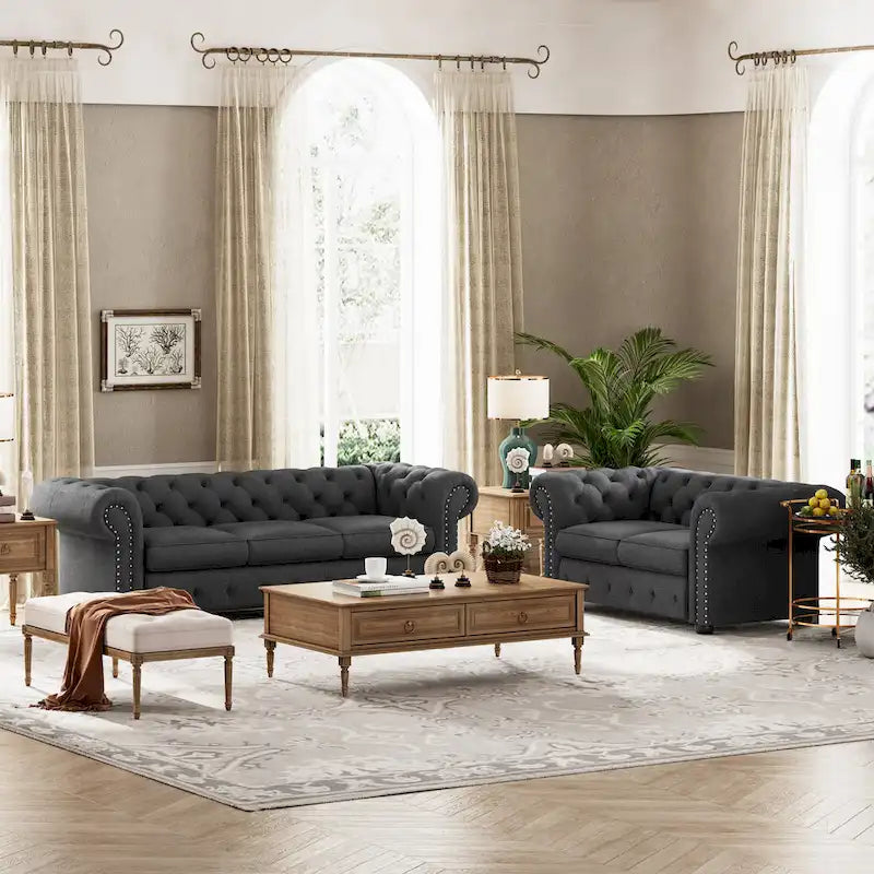 Ensemble 2 pièces comprenant un canapé et une causeuse Chesterfield à accoudoirs roulés et capitonnés