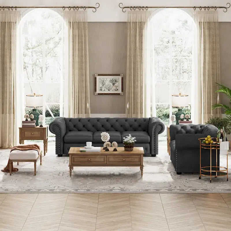 Ensemble 2 pièces comprenant un canapé et une causeuse Chesterfield à accoudoirs roulés et capitonnés