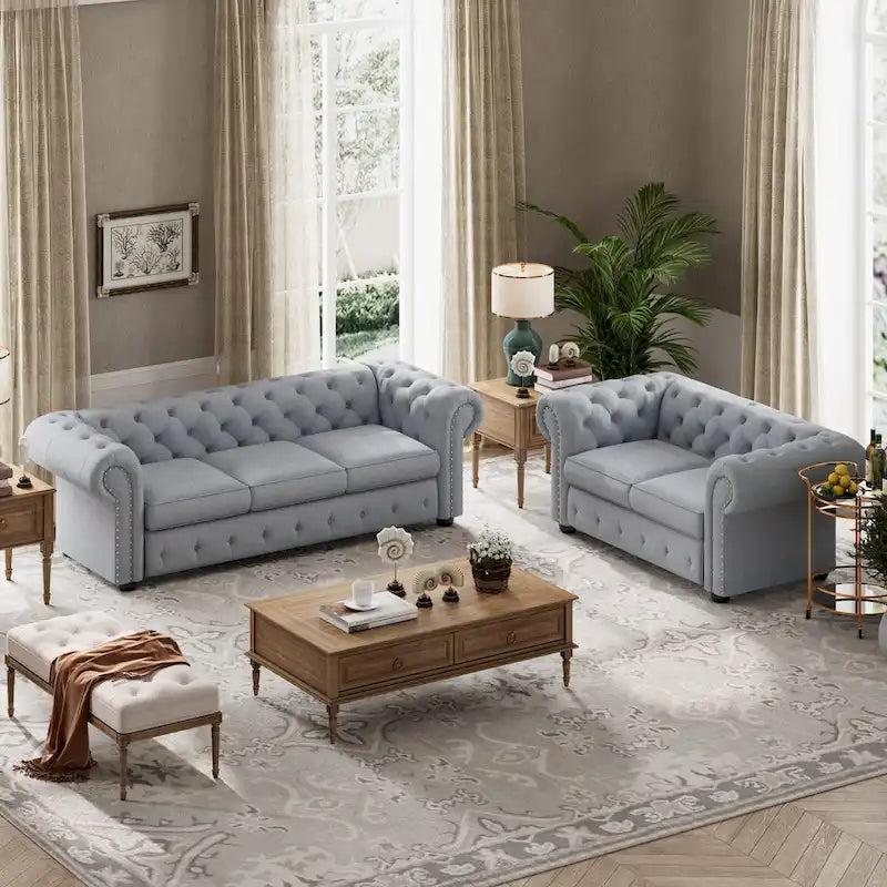 Ensemble 2 pièces comprenant un canapé et une causeuse Chesterfield à accoudoirs roulés et capitonnés