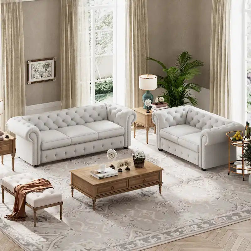 Ensemble 2 pièces comprenant un canapé et une causeuse Chesterfield à accoudoirs roulés et capitonnés